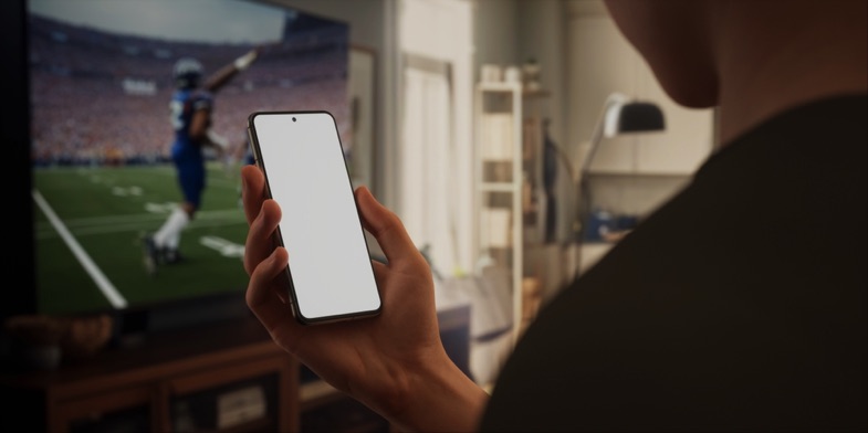 Watching American football on TV and placing a bet